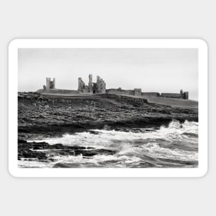 Waves along the rocky coast near Dunstanburgh Castle, Northumberland, UK Sticker
